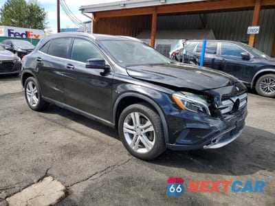 Czwarte zdjęcie samochodu z boku: 2015 MERCEDES-BENZ GLA 250 4MATIC VIN:WDCTG4GB2FJ119821 - miniatura