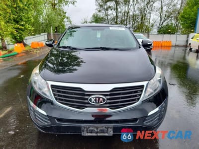 Piąte zdjęcie samochodu w środku: 2012 KIA SPORTAGE LX VIN:KNDPBCA24C7216438 - miniatura