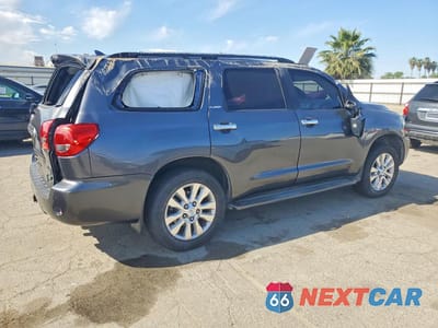 Trzecie zdjęcie samochodu z tyłu: 2016 TOYOTA SEQUOIA PLATINUM VIN:5TDDW5G1XGS144383 - miniatura