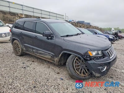 Czwarte zdjęcie samochodu z boku: 2016 JEEP GRAND CHEROKEE LAREDO VIN:1C4RJFAG9GC492751 - miniatura