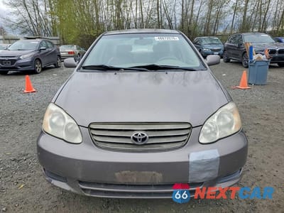 Piąte zdjęcie samochodu w środku: 2003 TOYOTA COROLLA LE VIN:1NXBR38E63Z124220 - miniatura