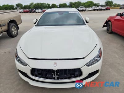 Piąte zdjęcie samochodu w środku: 2014 MASERATI GHIBLI S VIN:ZAM57RTA3E1113173 - miniatura