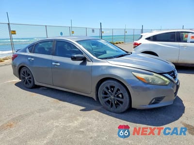 Czwarte zdjęcie samochodu z boku: 2017 NISSAN ALTIMA 2.5 SR VIN:1N4AL3AP3HC258814 - miniatura