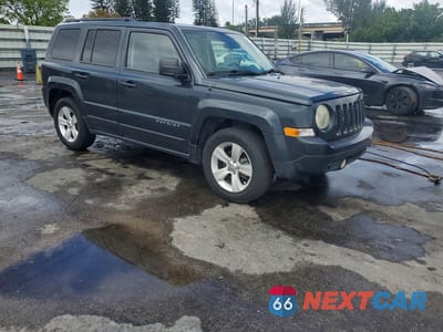 Czwarte zdjęcie samochodu z boku: 2014 JEEP PATRIOT LATITUDE VIN:1C4NJPFB0ED888169 - miniatura