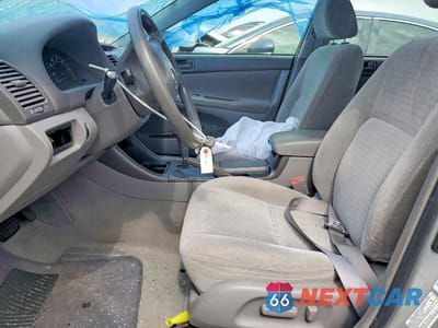 Zdjęcie 7 z 11 samochodu: 2003 TOYOTA CAMRY LE VIN:4T1BE32K53U781567 - miniatura