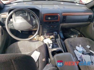 Zdjęcie 8 z 13 samochodu: 1999 JEEP GRAND CHEROKEE LAREDO VIN:1J4G258S6XC578277 - miniatura