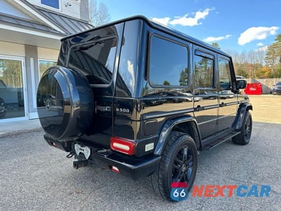 Czwarte zdjęcie samochodu z boku: 2003 MERCEDES-BENZ G 500 VIN:WDCYR49E23X140703 - miniatura