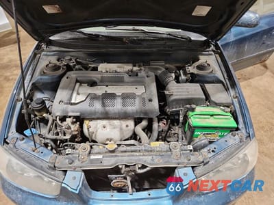 Zdjęcie 11 z 12 samochodu: 2001 HYUNDAI ELANTRA GL VIN:KMHDM45D91U057876 - miniatura