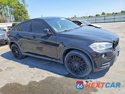Czwarte zdjęcie samochodu z boku: 2019 BMW X6 XDRIVE35I VIN:5UXKU2C52K0Z63919 - miniatura