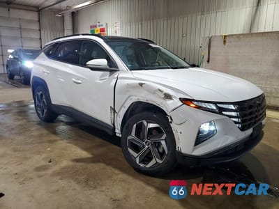 Czwarte zdjęcie samochodu z boku: 2023 HYUNDAI TUCSON LIMITED VIN:5NMJE3AE3PH183745 - miniatura