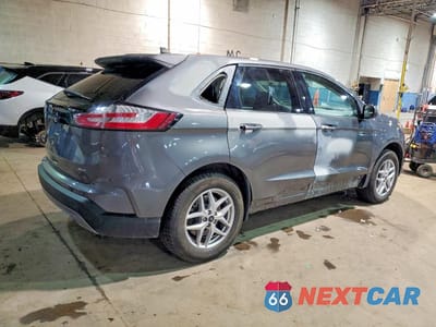 Trzecie zdjęcie samochodu z tyłu: 2023 FORD EDGE SEL VIN:2FMPK4J96PBA37054 - miniatura