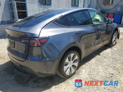 Trzecie zdjęcie samochodu z tyłu: 2021 TESLA MODEL Y VIN:5YJYGAEE3MF234276 - miniatura