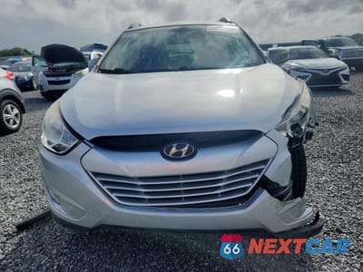 Piąte zdjęcie samochodu w środku: 2013 HYUNDAI TUCSON GLS VIN:KM8JU3AC9DU637708 - miniatura