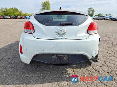 Zdjęcie 6 z 12 samochodu: 2013 HYUNDAI VELOSTER BASE VIN:KMHTC6AD7DU085356 - miniatura
