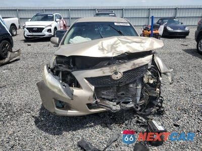 Piąte zdjęcie samochodu w środku: 2010 TOYOTA COROLLA LE VIN:2T1BU4EE1AC464379 - miniatura