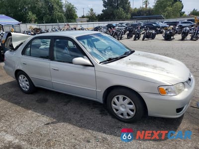 Czwarte zdjęcie samochodu z boku: 2001 TOYOTA COROLLA LE VIN:1NXBR12E01Z501263 - miniatura