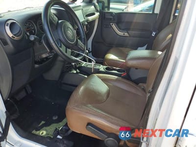 Zdjęcie 7 z 12 samochodu: 2017 JEEP WRANGLER UNLIMITED SAHARA VIN:1C4BJWEG0HL553708 - miniatura