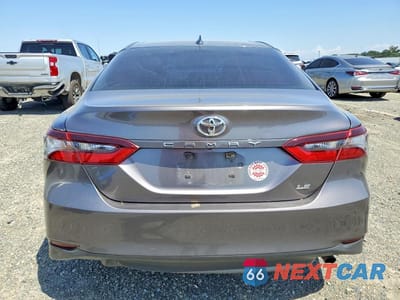 Zdjęcie 6 z 12 samochodu: 2021 TOYOTA CAMRY LE VIN:4T1C11AK2MU428890 - miniatura