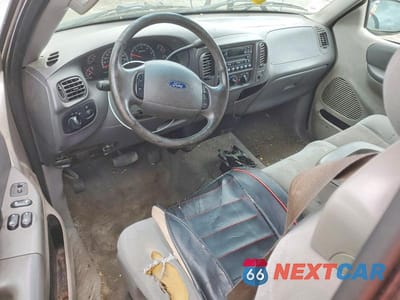 Zdjęcie 8 z 12 samochodu: 2003 FORD F150 VIN:1FTRX17W63NA88286 - miniatura