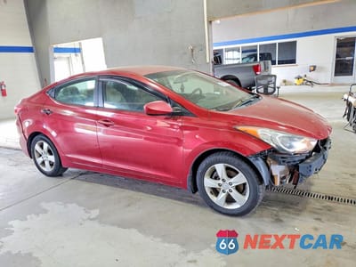 Czwarte zdjęcie samochodu z boku: 2012 HYUNDAI ELANTRA GLS VIN:KMHDH4AE8CU372996 - miniatura