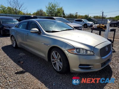 Czwarte zdjęcie samochodu z boku: 2013 JAGUAR XJL PORTFOLIO VIN:SAJWJ2GD4D8V51942 - miniatura