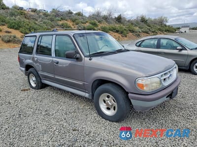 Czwarte zdjęcie samochodu z boku: 1996 FORD EXPLORER VIN:1FMDU34X0TZA79406 - miniatura