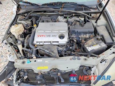 Zdjęcie 11 z 13 samochodu: 2004 TOYOTA CAMRY LE V6 VIN:4T1BF32K24U575928 - miniatura