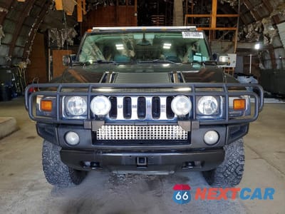 Piąte zdjęcie samochodu w środku: 2004 HUMMER H2 VIN:5GRGN23U74H107367 - miniatura