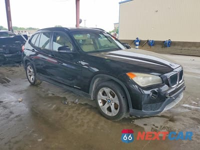 Czwarte zdjęcie samochodu z boku: 2014 BMW X1 SDRIVE28I VIN:WBAVM1C55EVW48254 - miniatura
