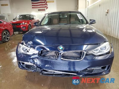 Piąte zdjęcie samochodu w środku: 2014 BMW 335 XI VIN:WBA3B9C53EF588593 - miniatura