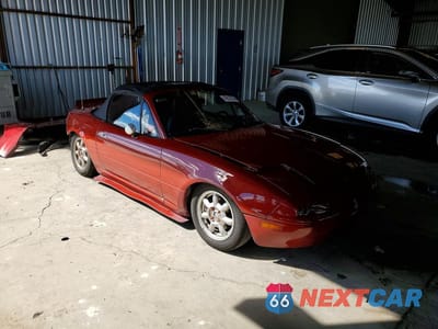 Czwarte zdjęcie samochodu z boku: 1994 MAZDA MX-5 MIATA VIN:JM1NA3536R0517632 - miniatura