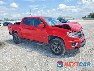 Czwarte zdjęcie samochodu z boku: 2015 CHEVROLET COLORADO Z71 VIN:1GCGTCE37F1215114 - miniatura
