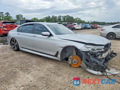 Czwarte zdjęcie samochodu z boku: 2017 BMW 750 XI VIN:WBA7F2C57HG421875 - miniatura