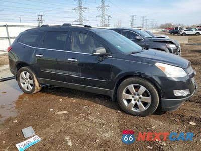 Czwarte zdjęcie samochodu z boku: 2011 CHEVROLET TRAVERSE LTZ VIN:1GNKVLEDXBJ318106 - miniatura