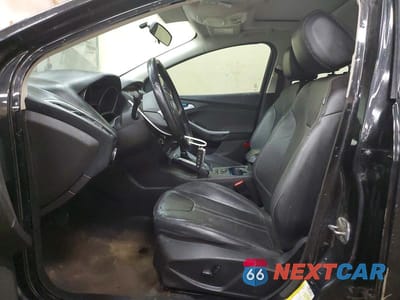 Zdjęcie 7 z 12 samochodu: 2013 FORD FOCUS TITANIUM VIN:1FADP3N24DL304015 - miniatura