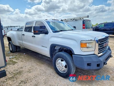 Czwarte zdjęcie samochodu z boku: 2015 GMC SIERRA K3500 VIN:1GT421C80FF631355 - miniatura