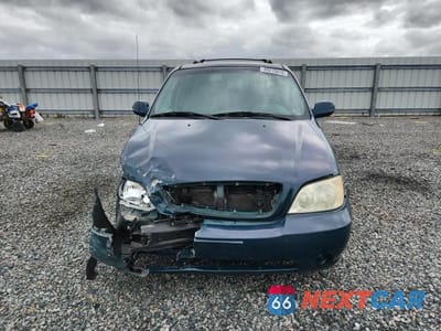 Piąte zdjęcie samochodu w środku: 2005 KIA SEDONA LX VIN:KNDUP131X56630572 - miniatura