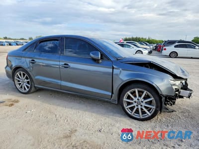 Czwarte zdjęcie samochodu z boku: 2015 AUDI A3 PREMIUM VIN:WAUACGFF7F1078307 - miniatura