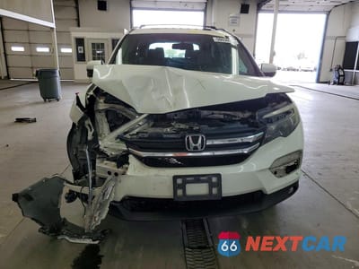 Piąte zdjęcie samochodu w środku: 2017 HONDA PILOT EXL VIN:5FNYF6H57HB024006 - miniatura