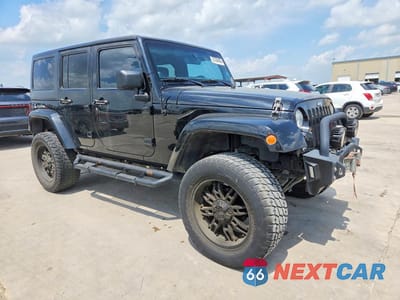 Czwarte zdjęcie samochodu z boku: 2014 JEEP WRANGLER UNLIMITED SAHARA VIN:1C4BJWEG9EL100473 - miniatura