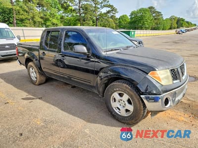 Czwarte zdjęcie samochodu z boku: 2007 NISSAN FRONTIER SE VIN:1N6AD07U97C443657 - miniatura
