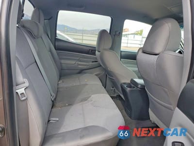 Zdjęcie 10 z 12 samochodu: 2013 TOYOTA TACOMA V6 VIN:3TMLU4EN7DM105246 - miniatura