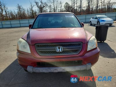 Piąte zdjęcie samochodu w środku: 2004 HONDA PILOT EXL VIN:2HKYF18604H575661 - miniatura