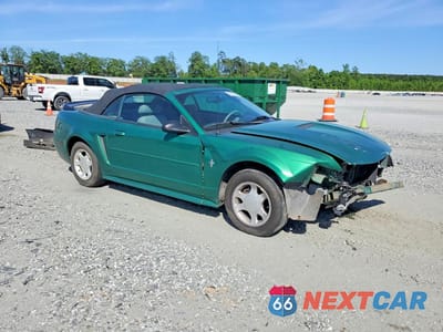 Czwarte zdjęcie samochodu z boku: 2000 FORD MUSTANG VIN:1FAFP444XYF283242 - miniatura