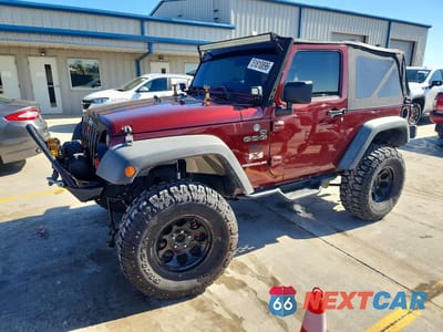 2009 JEEP WRANGLER X 1J4FA24169L719734 - główne zdjęcie licytacji z USA - miniatura