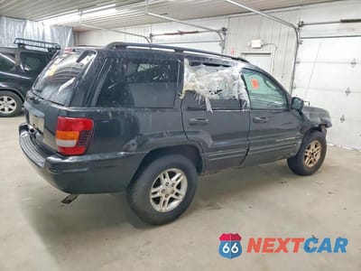 Trzecie zdjęcie samochodu z tyłu: 2002 JEEP GRAND CHEROKEE LAREDO VIN:1J4GW48S52C315852 - miniatura