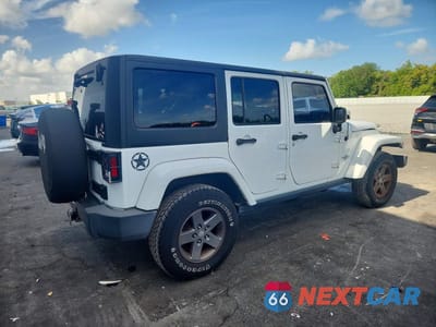 Trzecie zdjęcie samochodu z tyłu: 2015 JEEP WRANGLER UNLIMITED SPORT VIN:1C4BJWDG1FL572816 - miniatura