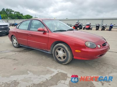 Czwarte zdjęcie samochodu z boku: 1999 FORD TAURUS SE VIN:1FAFP53U4XA293204 - miniatura