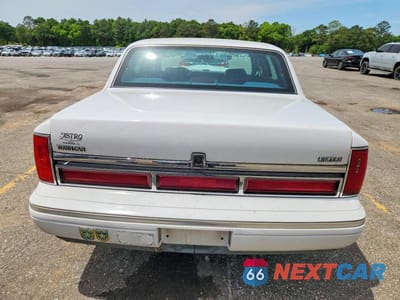 Zdjęcie 6 z 12 samochodu: 1997 LINCOLN TOWN CAR EXECUTIVE VIN:1LNLM81W7VY668840 - miniatura