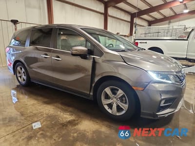 Czwarte zdjęcie samochodu z boku: 2018 HONDA ODYSSEY EXL VIN:5FNRL6H74JB043522 - miniatura